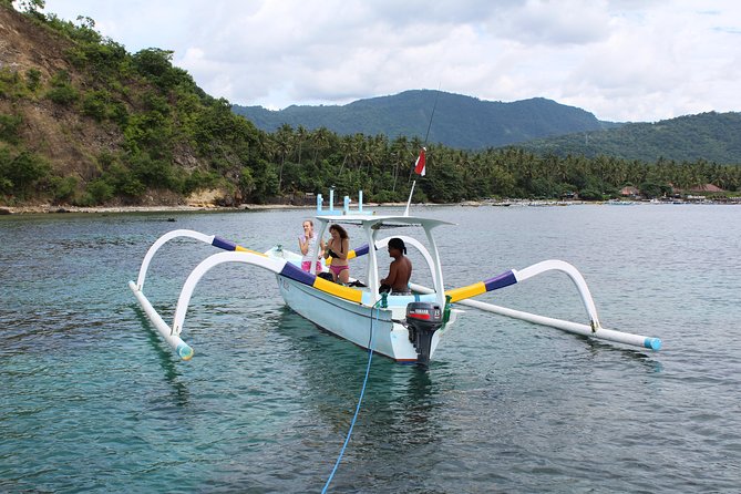 Amazing Blue Lagoon Snorkeling with Private Hotel Transfer - Fisherman village check-in and traditional boat time