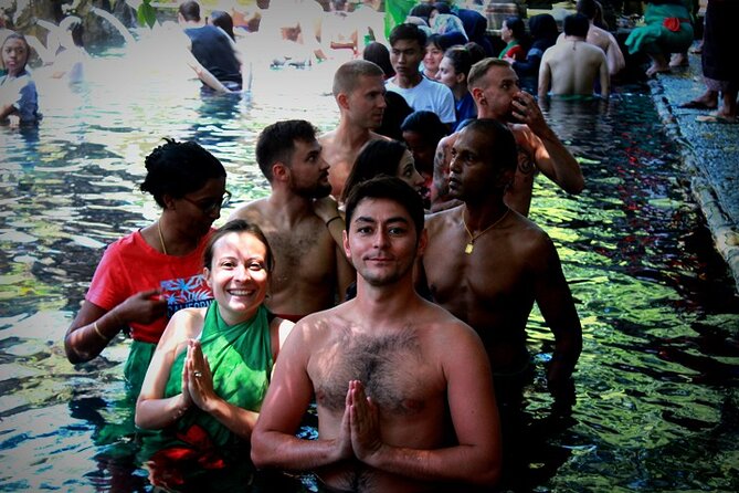 Bali Day Trip: Ubud Temples & Hidden Waterfalls - Tibumana Waterfall walk: bamboo bridges and close-up jungle