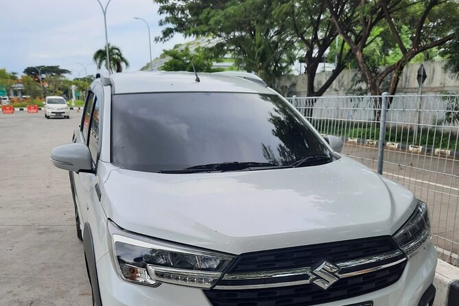 Bali Private Airport Pick up - The Car Comfort Package: A/C, Water, and Private Use
