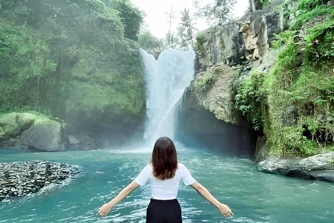 Bali Tour : Tegenungan - Tukad Cepung - Kanto Lampo - Tibumana Waterfall - Tibumana Waterfall: the twin-falls look, and why water flow changes the view