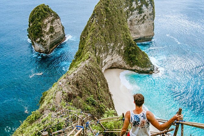 Day Trip to Nusa Penida with All Inclusive - Crystal Bay: sandy cove, palms, and snorkeling-friendly water
