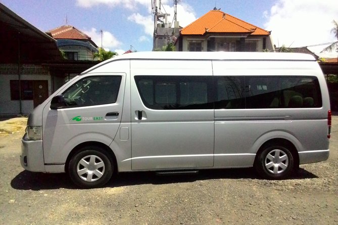 Denpasar Departure Transfer: Hotel to Airport - Inside the Vehicle: AC, Water, and a Licensed English Guide