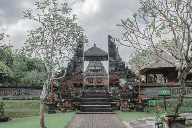 Full Day Private Tour to Ubud Waterfall and Tanah Lot Sunset - Taman Ayun Temple in Mengwi: gardens + Bali architecture with breathing room
