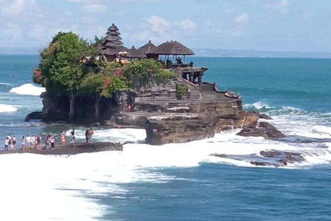 Half Day Tanah Lot Temple Private Guided Tour - Stop 1: Taman Ayun Temple and the Peaceful Fish Pond