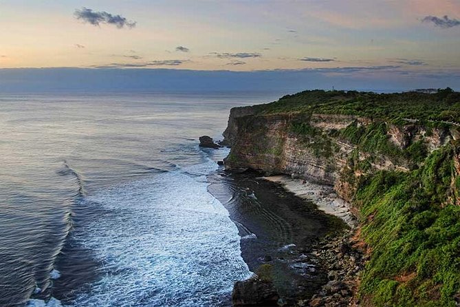 Halfday Tour:Uluwatu Temple,Kecak Dance and Dinner Jimbaran Beach with Transport - Stop 1: Uluwatu Temple and the 70-metre cliff views