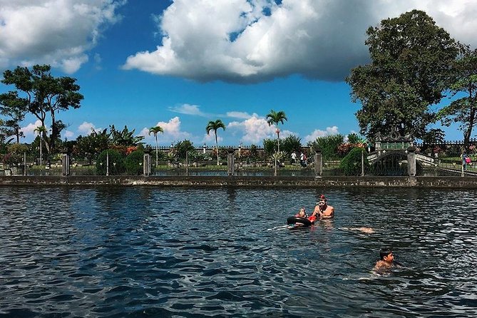 Lempuyang Gates of Heaven, Tirta Gangga Temple Swim & Jungle Waterfalls - Tukad Cepung waterfall: getting the rays without fighting the crowds