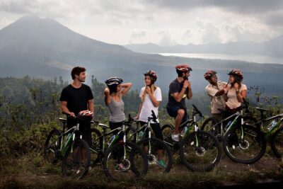 Mountain Cycling Tour - The pre-ride setup at Mason Adventures: helmets, water, and real bike instructions