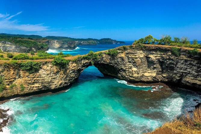No:#1. Penida Island Tour And Snorkeling With Manta - Gear, life jackets, and safety with a guide watching
