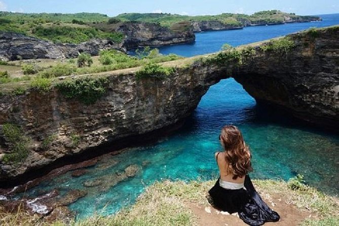 Nusa Penida One Day Trip with All-inclusive - Crystal Bay: pale sand, palm trees, and optional snorkeling gear