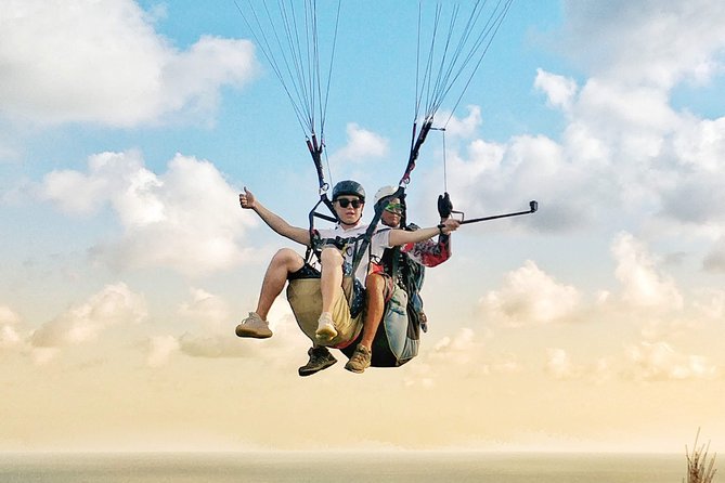 Paragliding Bali Nusa Dua cliff with Free Photo/Videos - Where You Fly: Panda Paragliding at Tanah Barak (Jimbaran Area)