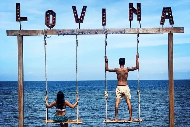 Private Full-Day Lovina Dolphin Watching and Snorkeling Boat Tour - Private car comfort on a long north drive