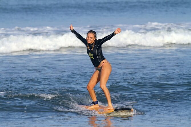 Private Surfing Lesson Bali - In the water: two chances to catch waves with an instructor watching