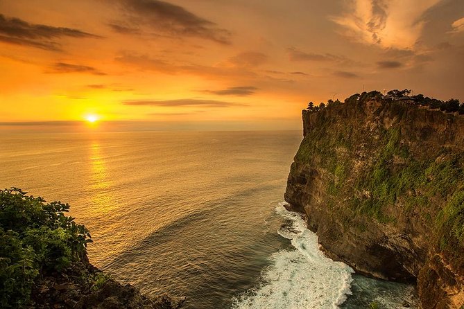 Private Tour Bali Beaches and Uluwatu Temple with Dinner - Padang Padang Beach: The Rock Walk, Surf Fame, and Swim Time
