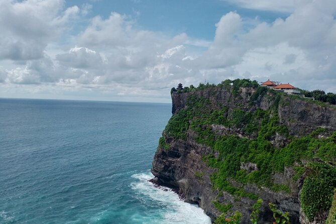 Tanah Lot and Uluwatu Temple Private Guided Tour - Padang Padang Beach: the rock-cave setting and a calmer swim window