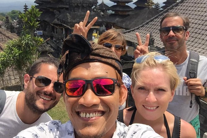 Tanah Lot and Uluwatu Temple Private Guided Tour - Tanah Lot Temple: volcanic rock views, garden paths, and heat