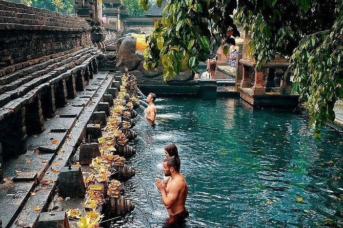 Ubud Hidden Gems Waterfall, Temple and Rice Terraces Private Tour - Stop 3: Tukad Cepung waterfall, where sunlight turns the canyon into a photo moment