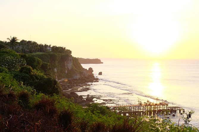Uluwatu Sunset, Kecak Dance and Jimbaran Seafood Dinner - Suluban Beach: cliff steps, ocean views, and sunset-friendly vibes